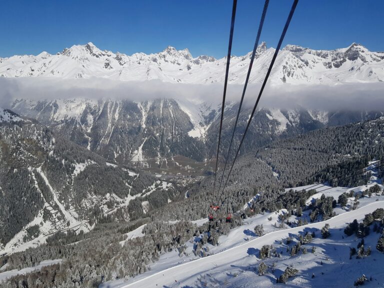 Ski lift climbing a mountain in the Alps