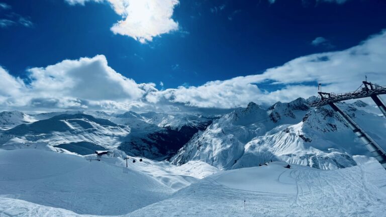 Snow-covered mountain with a ski lift in the distance, St. Anton am Arlberg